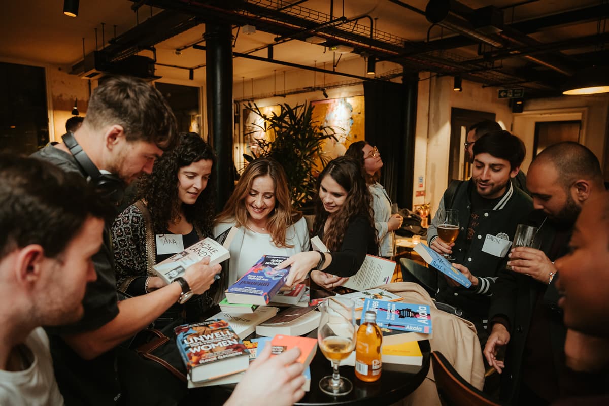 Rebel Book Club members sharing books
